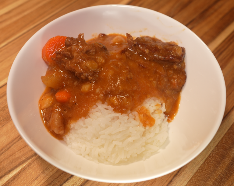 Bowl of Instant Pot Beef Kaldereta